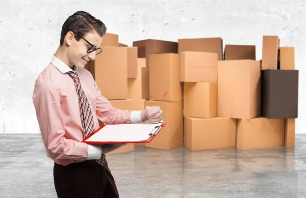 Happy businessman with inventory — Stock Photo, Image