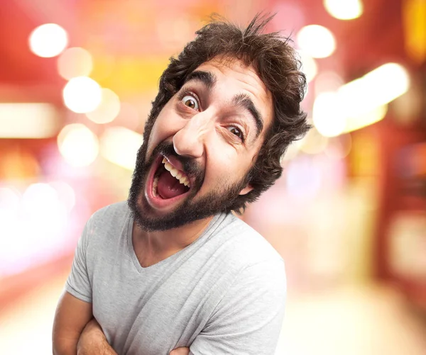 Crazy young man in happy pose — Stock Photo, Image