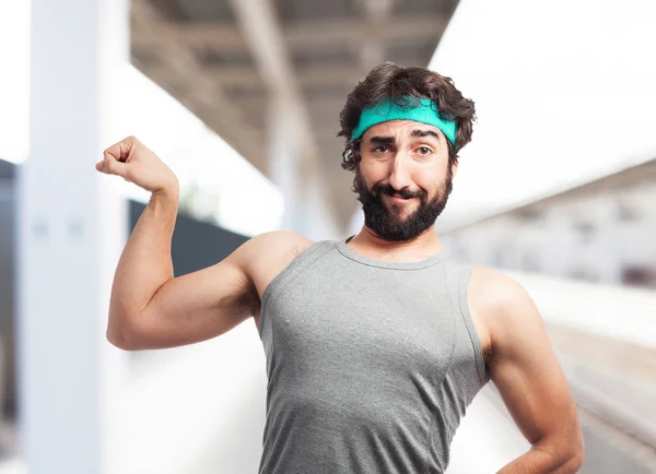 Happy sport man in strong pose — Stock Photo, Image