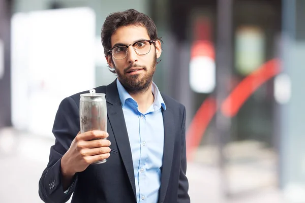 Indian businessman with a beer — Stock Photo, Image