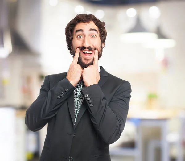 Hombre de negocios feliz con expresión sorprendida — Foto de Stock