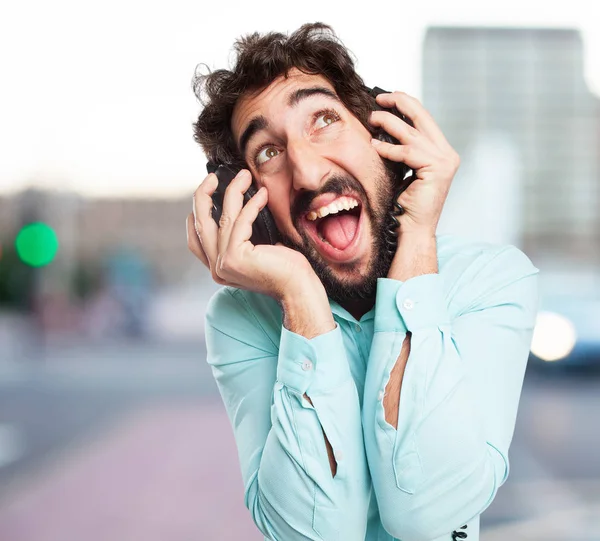 Gelukkig jonge man met hoofdtelefoon — Stockfoto