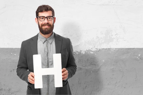 Happy man with letter H — Stock Photo, Image