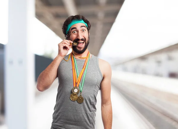 Happy sport man with medal — Stock Photo, Image