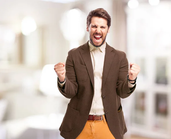 Glücklicher Geschäftsmann in Jubelpose — Stockfoto