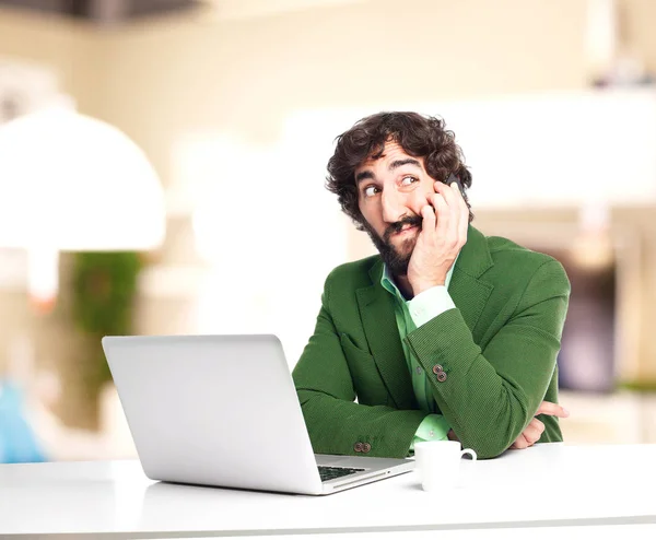 confused businessman with telephone