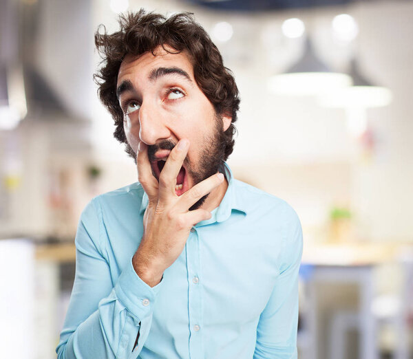 boring young man yawning