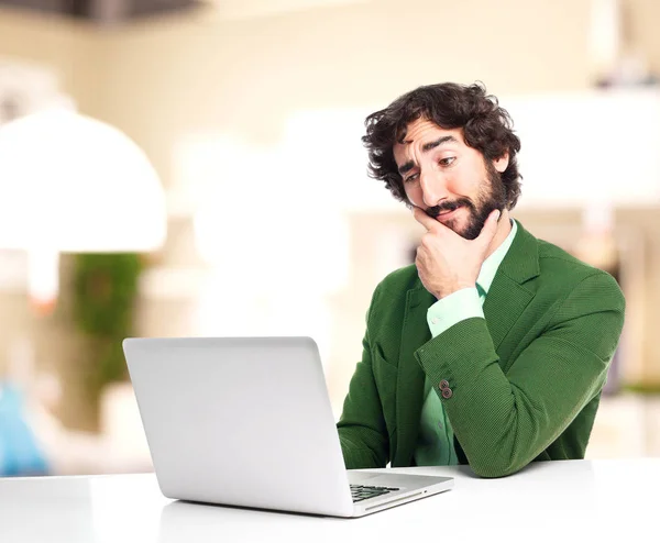 Businessman thinking with laptop — Stock Photo, Image