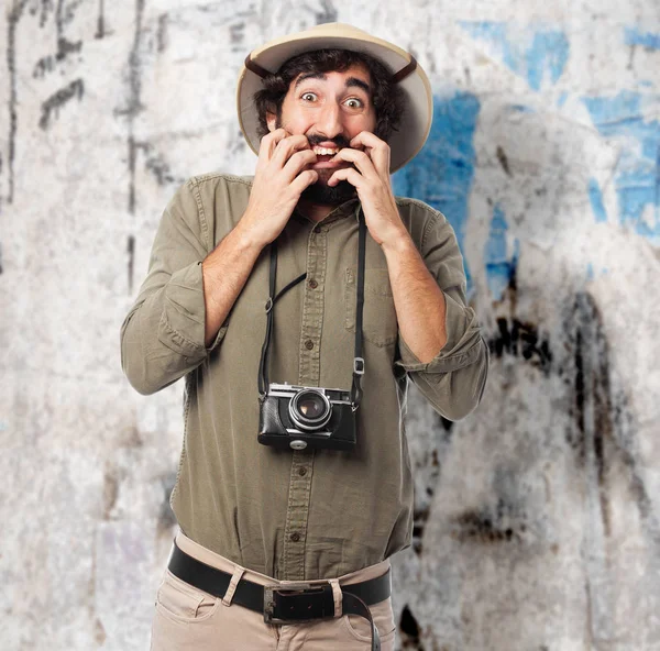 Crazy explorer man with scared sign — Stock Photo, Image