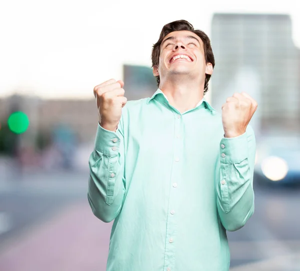 Feliz hombre de negocios en la celebración de pose —  Fotos de Stock