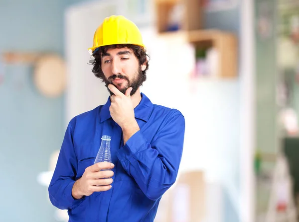 Happy worker man with water bottle — Stock Photo, Image