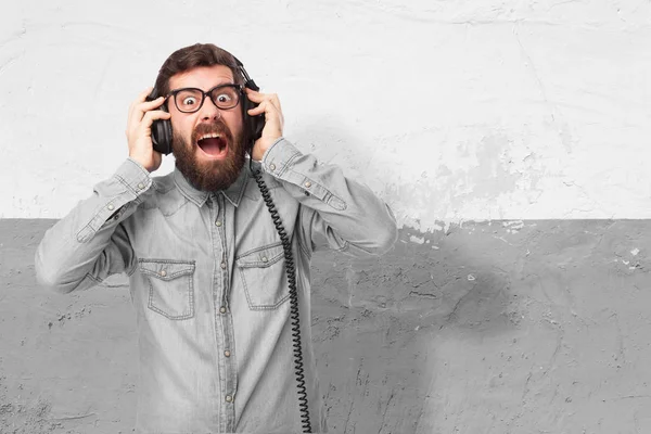 Crazy young man with headphones — Stock Photo, Image