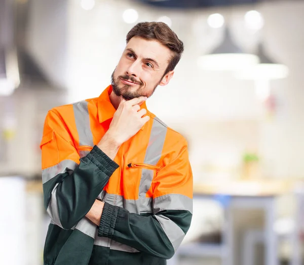 Happy worker man thinking — Stock Photo, Image