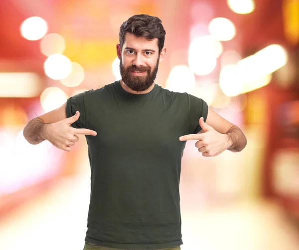 Happy young man showing gesture — Stock Photo, Image