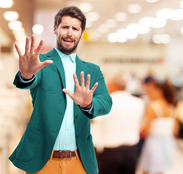 Hombre de negocios feliz con gesto de parada — Foto de Stock