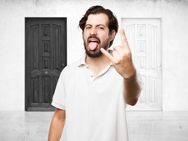 Angry young man with disagree sign — Stock Photo, Image