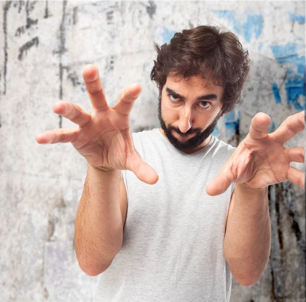 Angry young man with worried expression — Stock Photo, Image