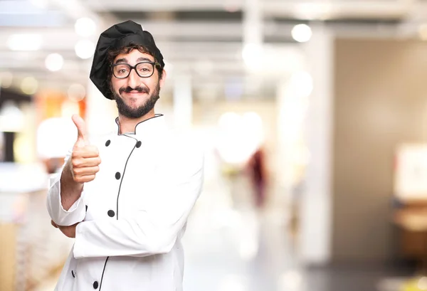 Gelukkig kok man met goed teken — Stockfoto