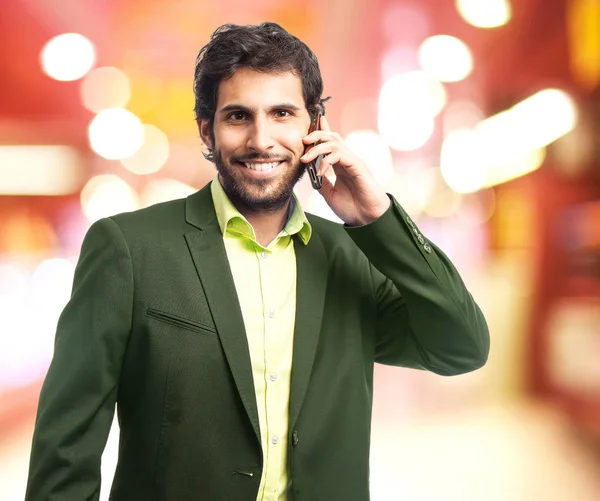 Happy businessman with mobile phone — Stock Photo, Image