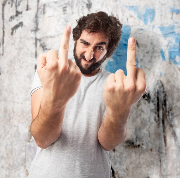 Angry young man met disagree teken — Stockfoto