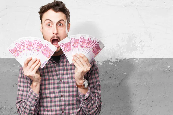 Joven feliz con billetes —  Fotos de Stock