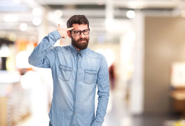 Glad ung man med tanken tecken — Stockfoto