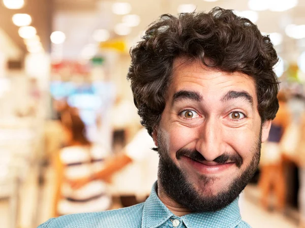 Crazy young man in happy pose — Stock Photo, Image