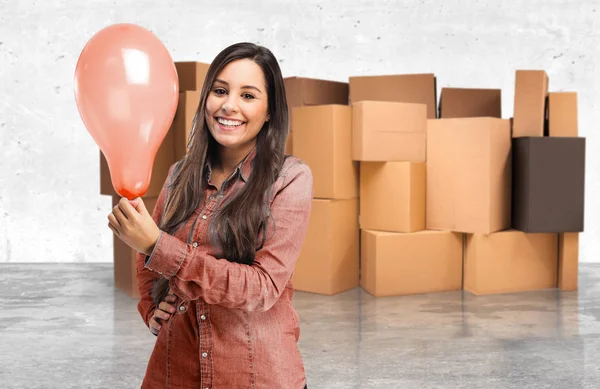 Happy young woman with balloon — Stock Photo, Image
