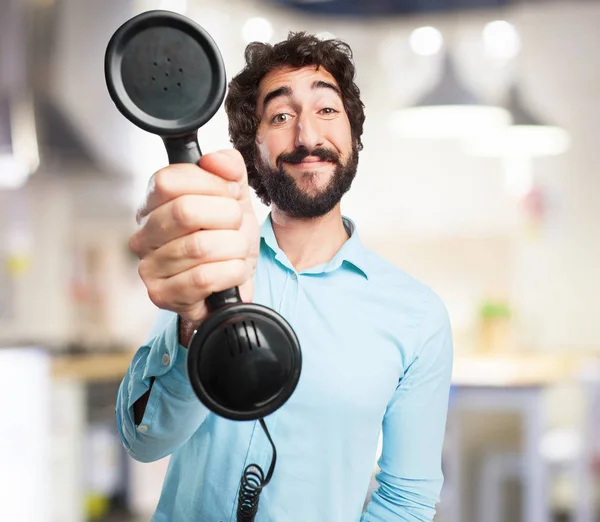 Heureux jeune homme avec téléphone — Photo