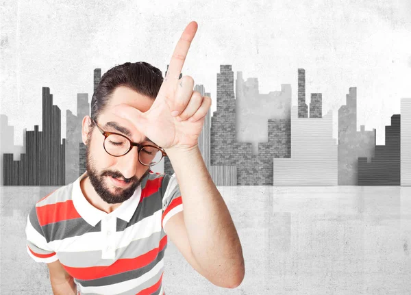 Crazy young man with loser sign — Stock Photo, Image