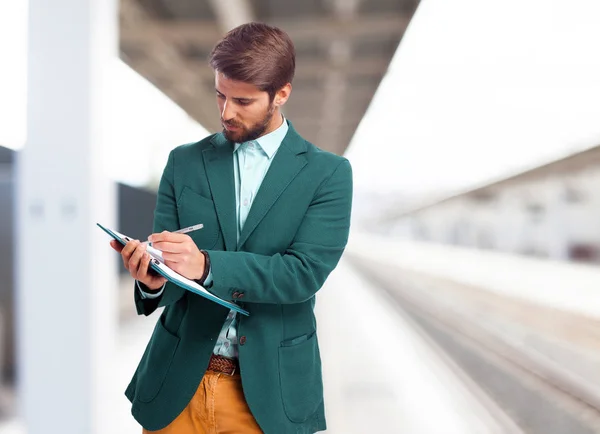 Hombre de negocios feliz con cuaderno — Foto de Stock