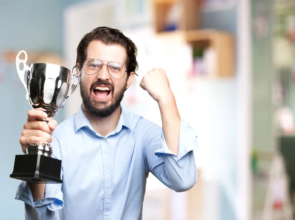 Happy young man with sport cup — Stock Photo, Image