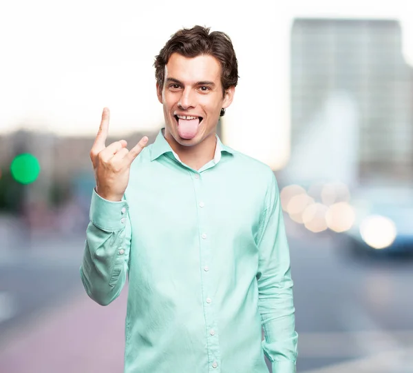 Crazy young man with disagree sign — Stock Photo, Image