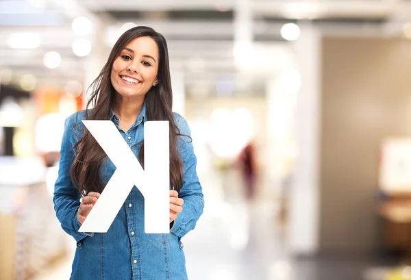Happy young woman with letter k — Stock Fotó