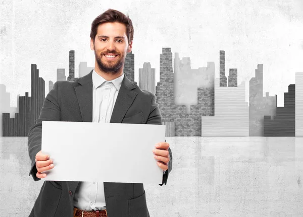 Happy businessman with banner — Stock Photo, Image