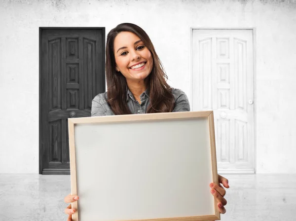 Happy young woman with placard — Stock Photo, Image