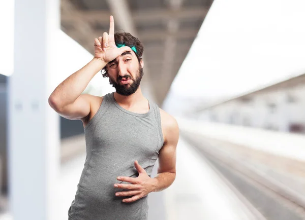 Sad sport man with loser sign — Stock Photo, Image