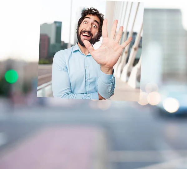 Gek jongeman met stop gebaar — Stockfoto