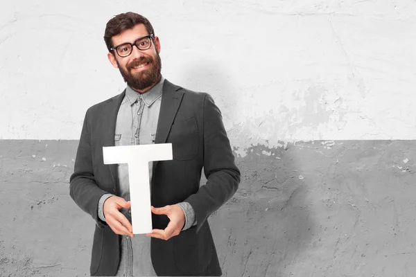 Homem feliz com letra T — Fotografia de Stock