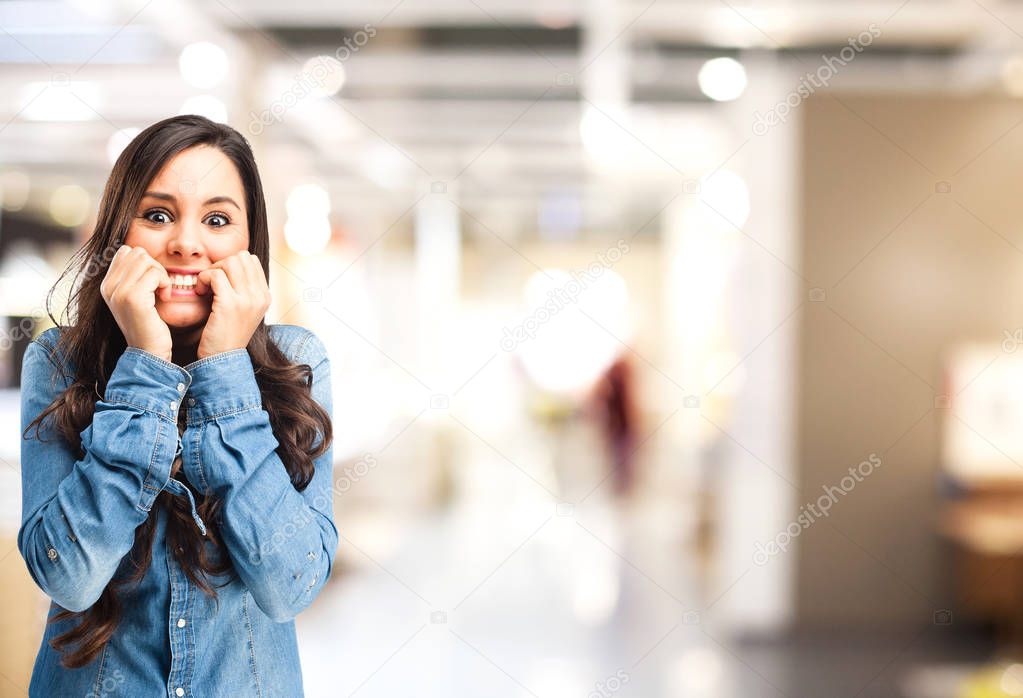 scared young woman in worried pose
