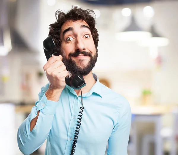 Happy young man with telephone — Stock Photo, Image