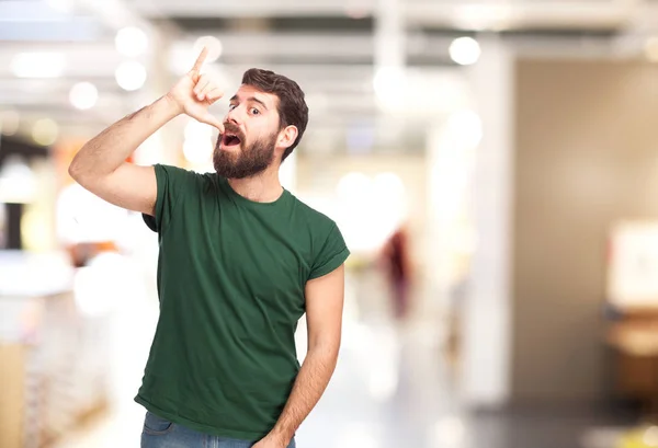 Işareti içme ile mutlu genç adam — Stok fotoğraf
