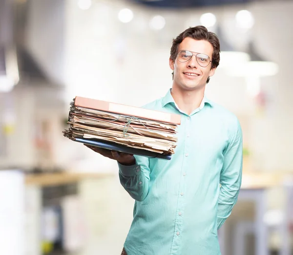 Happy young man with files — Stock Photo, Image