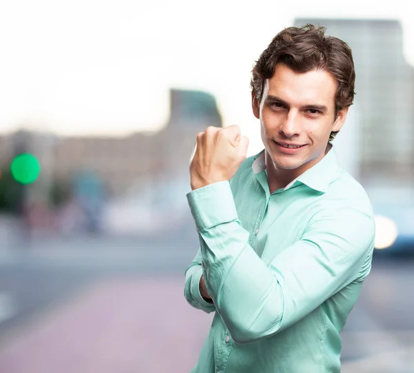 Happy businessman in celebrating pose — Stock Photo, Image