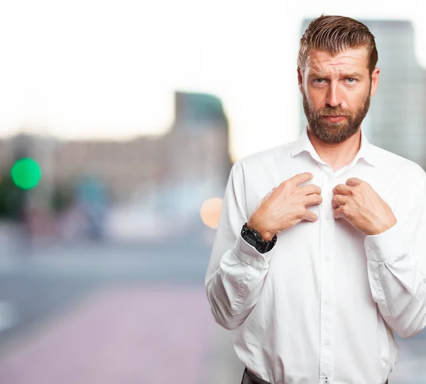 Worried young man in confused pose — Stock Photo, Image