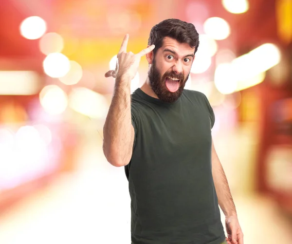 Angry young man with disagree sign — Stock Photo, Image