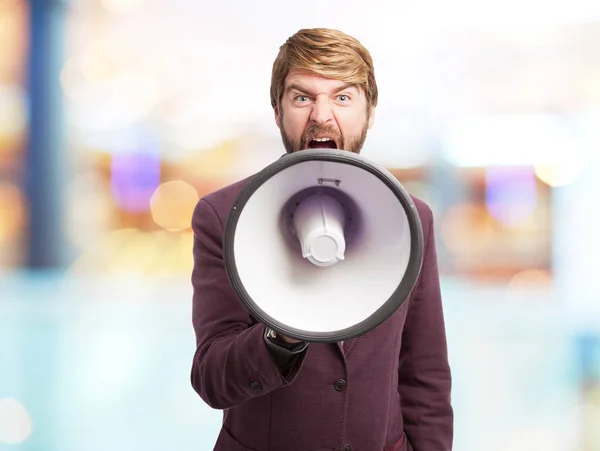 Homem de negócios zangado com megafone — Fotografia de Stock