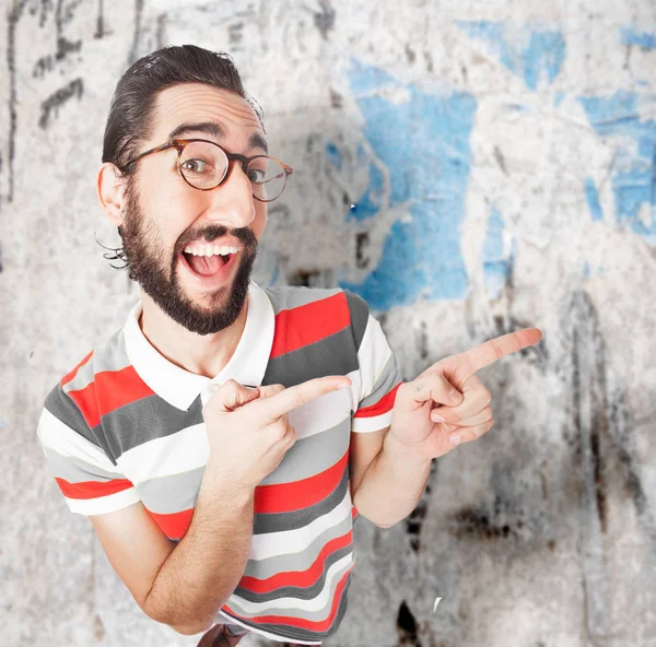 Loco joven apuntando al frente — Foto de Stock