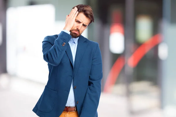 Worried businessman with boring sign — Stock Photo, Image