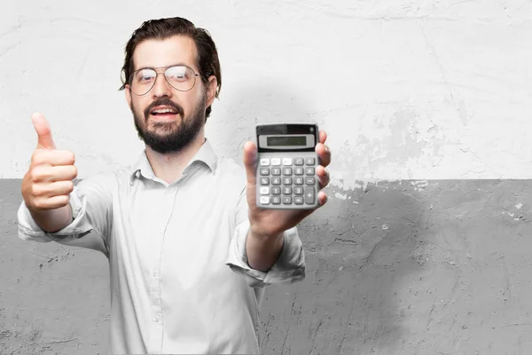 Gelukkig jonge man met calculator — Stockfoto